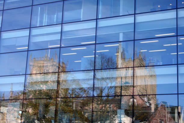 Closeup of glass windows with reflection of Bristol Cathedral