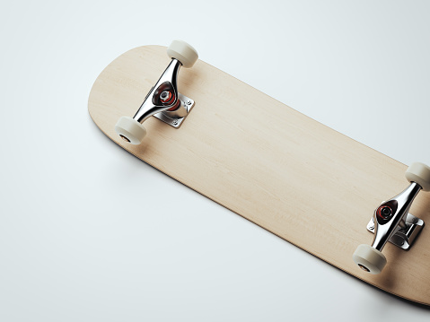 Blank wooden skateboard isolated on white background. 3d rendering