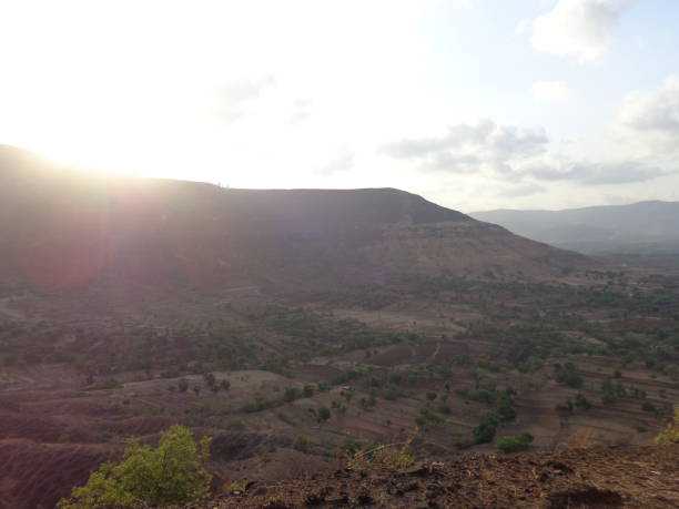 istock Scenic view of landscape against sky 877009638