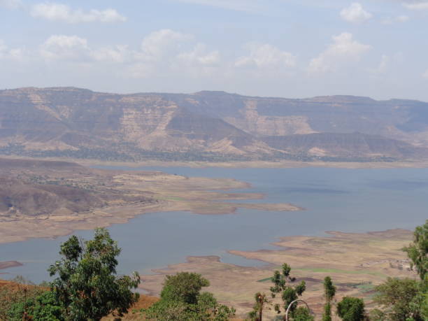 istock Scenic view of landscape against sky 877009890
