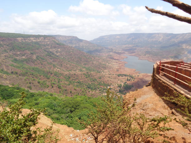 istock Scenic view of landscape against sky 877010072