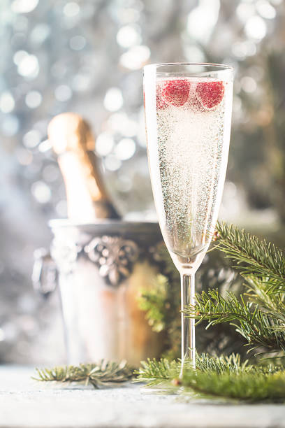istock Champagne glass on sparkling background 877018216