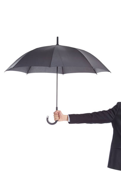 istock human hand holding a black umbrella 877018850