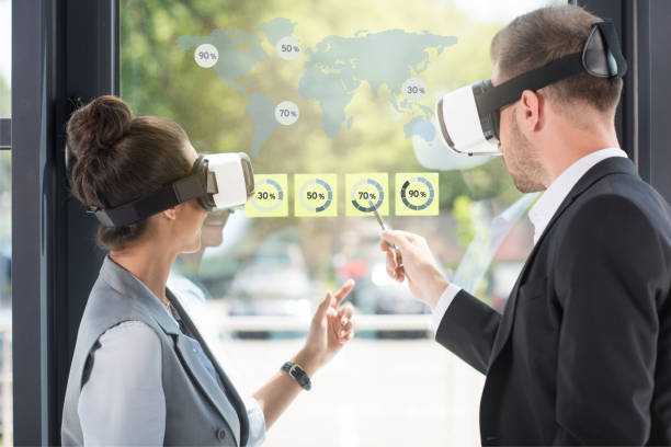 istock businesspeople in vr headsets 877018898