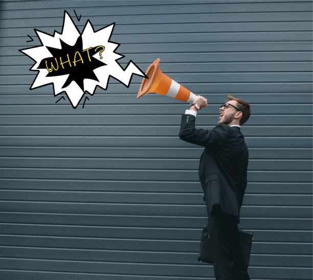 istock Businessman with traffic cone 877019678