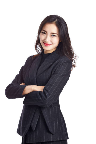 portrait of a young asian business woman studio portrait of a young asian businesswoman in formal wear, arms crossed, isolated on white background. isolated businesswoman isolated on white beauty stock pictures, royalty-free photos & images