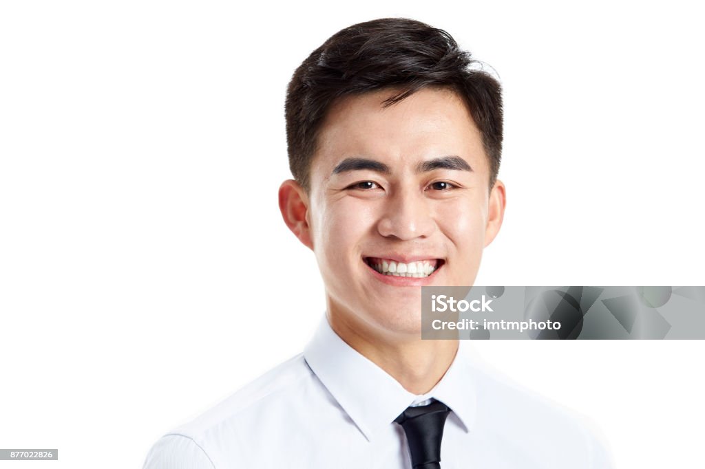 Retrato de un hombre de negocios asiático joven feliz - Foto de stock de Asia libre de derechos