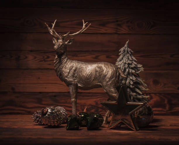 istock golden reindeer near christmas decorations 877024012