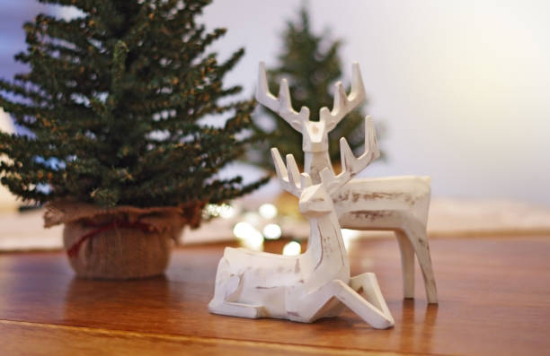 istock Deer Christmas decorations with lights and trees 877029816