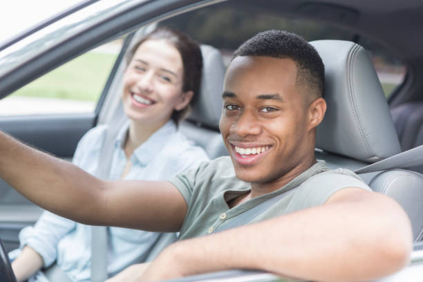 istock Happy couple on a road trip 877029830