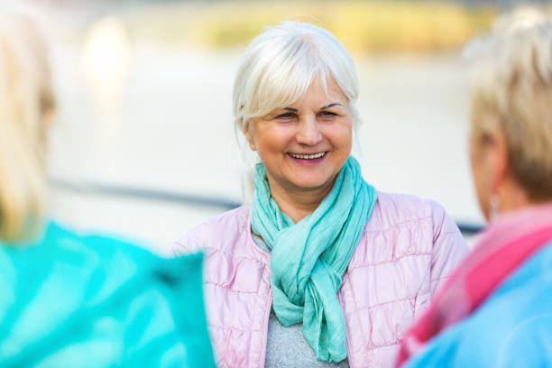 istock Group of elderly friends posing together 877030082