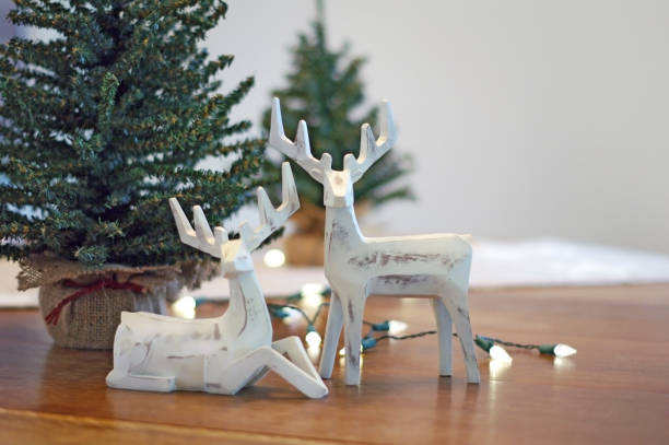 istock Deer Christmas decorations with lights and trees 877030188