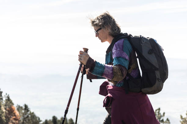 istock Mature Woman Hiking in Mountains 877030734