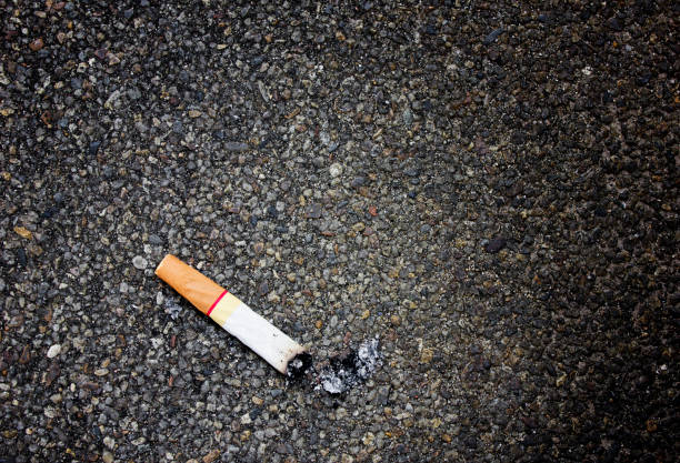 istock Close up cigarette butts for background 877030844