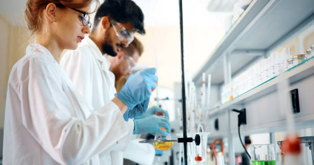 Group of chemistry students working in laboratory