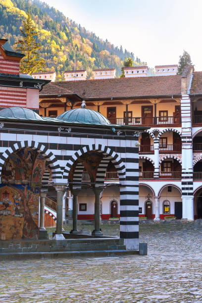 istock Rila Monastery, Bulgaria and autumn mountains 877034874