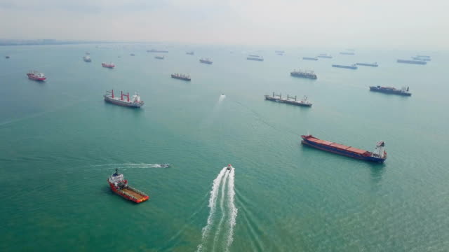 Aerial Cargo ships anchored in the sea. Singapore