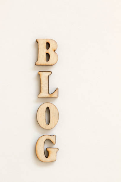 istock BLOG, Wood letters LOVE on White background 877038470