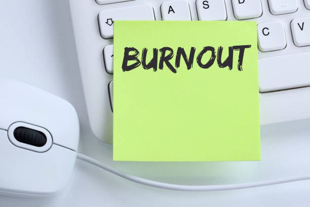 istock Burnout ill illness stress stressed at work business concept mouse 877052854