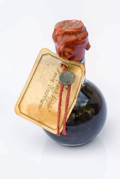 bottle of traditional balsamic vinegar on a white background - vinegar balsamic vinegar modena italy imagens e fotografias de stock