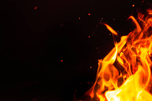 istock Red hot flames of fire isolated on black 877063966