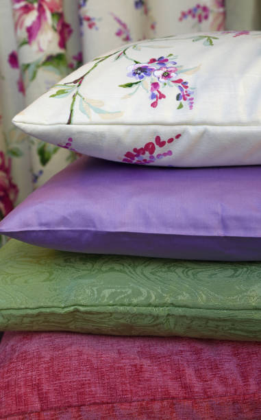 istock Selection of colorful pillows in retail store 877063984
