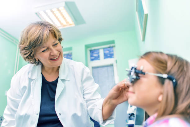 istock Girl Undergoing Eye Test In Clinic 877065100