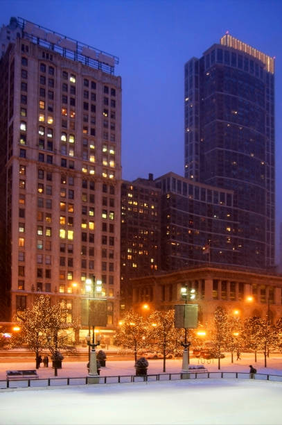 istock Beautiful winter night in Chicago. Urban architecture background. 877072584
