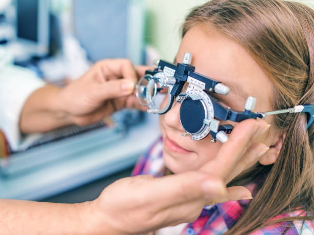 istock Girl Undergoing Eye Test In Clinic 877075512