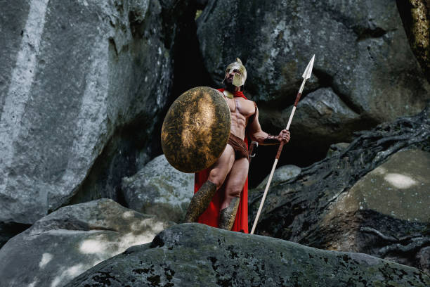 istock Spartan warrior in the woods 877075558