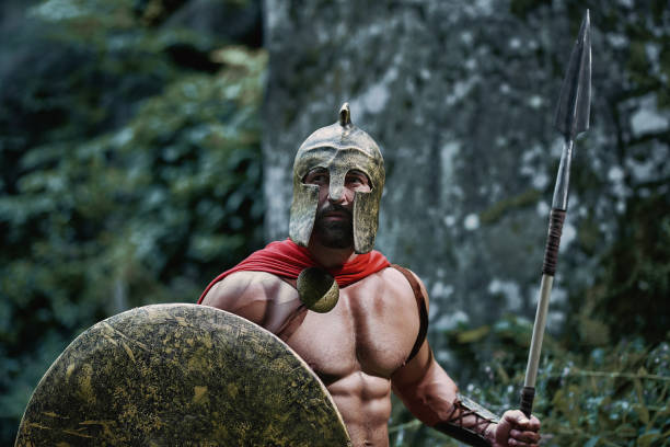 istock Spartan warrior in the woods 877075932