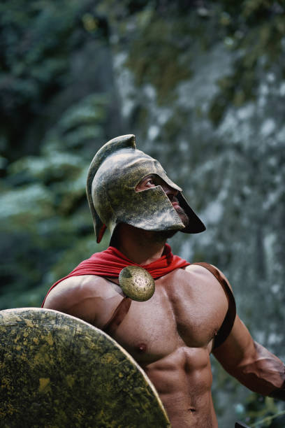 istock Spartan warrior in the woods 877076010