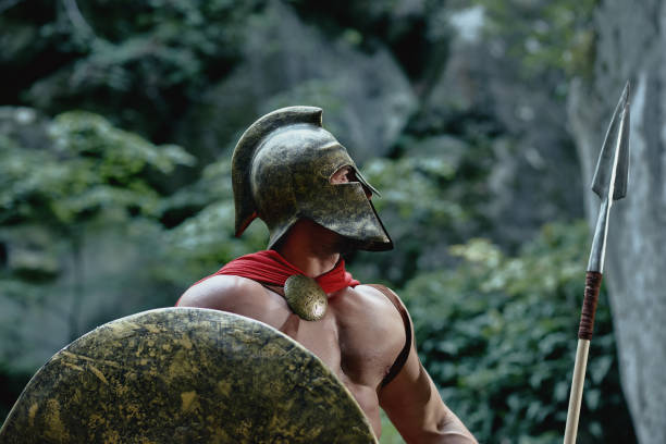 istock Spartan warrior in the woods 877076172