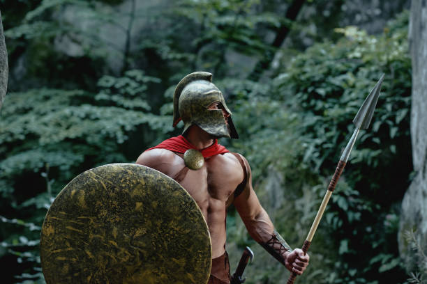istock Spartan warrior in the woods 877076286