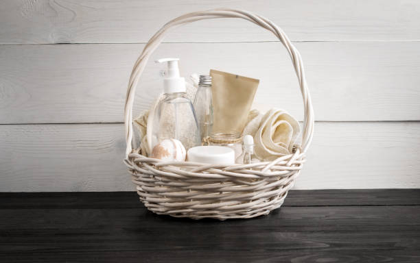 Wicker basket with spa treatments on table