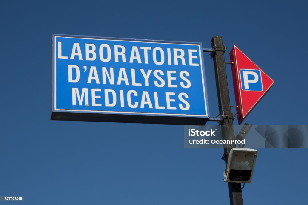 Sign of laboratory at medical center in french Laboratoire medical Accidents and Disasters Stock Photo