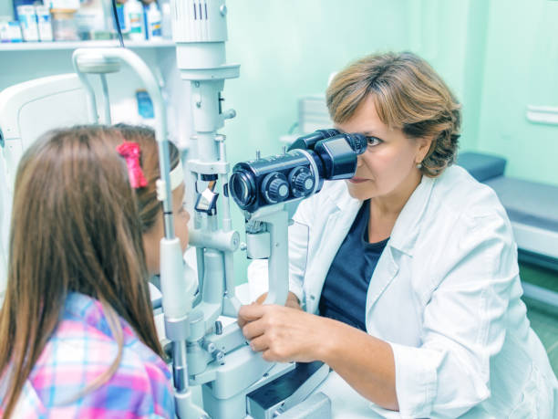 istock Girl Undergoing Eye Examination 877079852