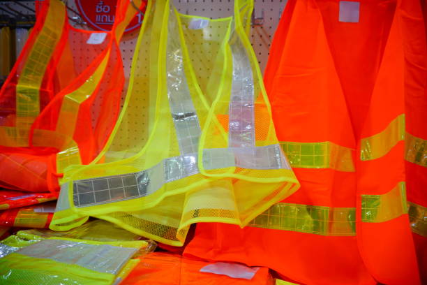 istock orange reflective vest as part of protection uniform 877083356