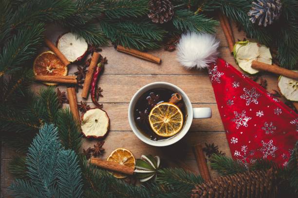 istock Cup of tea and Christmas decoratio 877086982