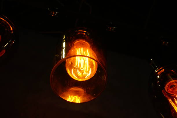 istock Crowd of Hanging Light Bulbs, Idea concept 877088266
