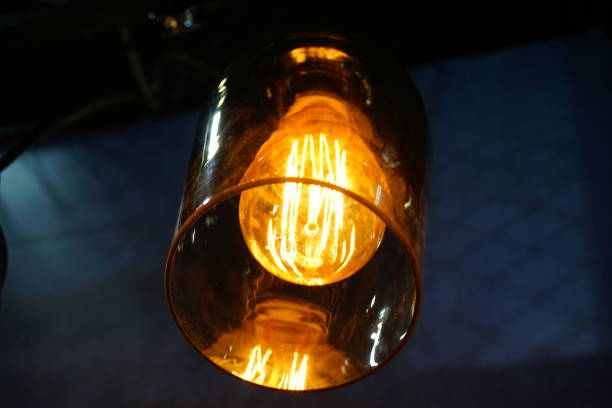 istock Crowd of Hanging Light Bulbs, Idea concept 877091288
