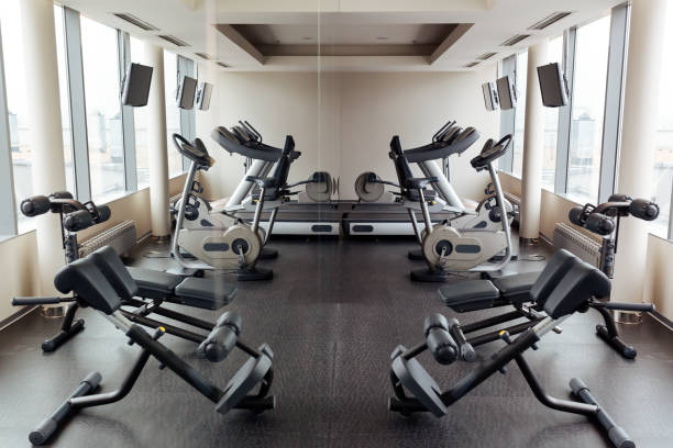 istock Equipped gym overlooking the city 877095560