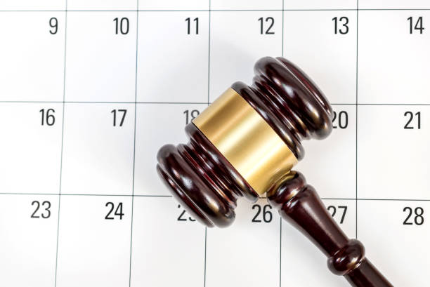 istock Judge's gavel on the calendar. Top view. 877098766