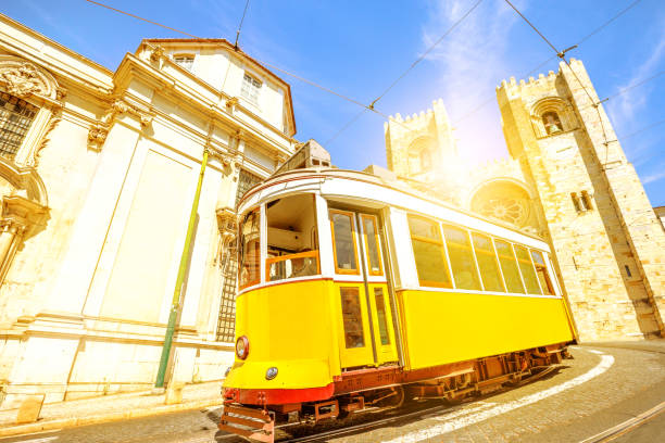 istock Historic tram and Lisbon Cathedral 877106232