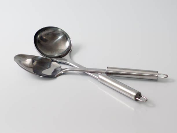 istock grey metal scoop and a serving spoon 877109674