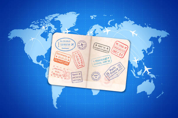 istock Open foreign passport with international visa stamps on blue modern world map with airline routes 877111290