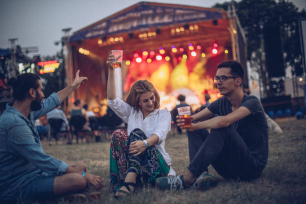 istock Enthusiastic crowd at music festival 877111952