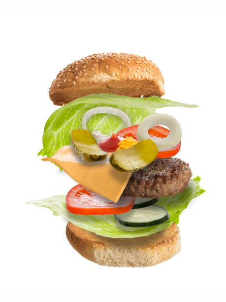 istock Delicious, tasty hamburger with floating flying ingredients 877115244
