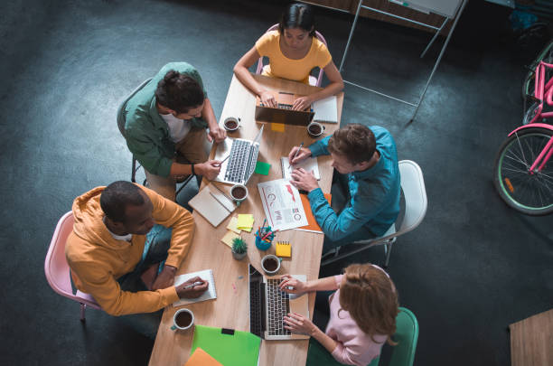 Serious colleagues having job in modern office