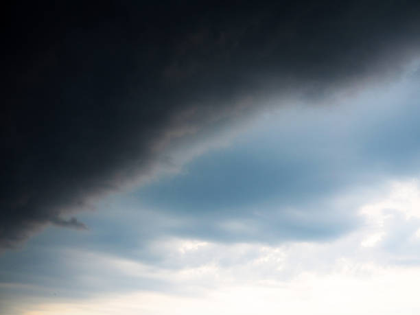 istock Storm front. Storm dark clouds. Onset of the hurricane 877122618